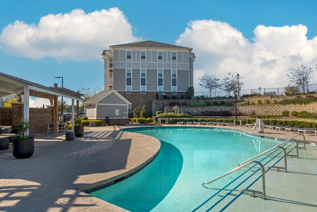 Pool with deck seating and covered pavilion