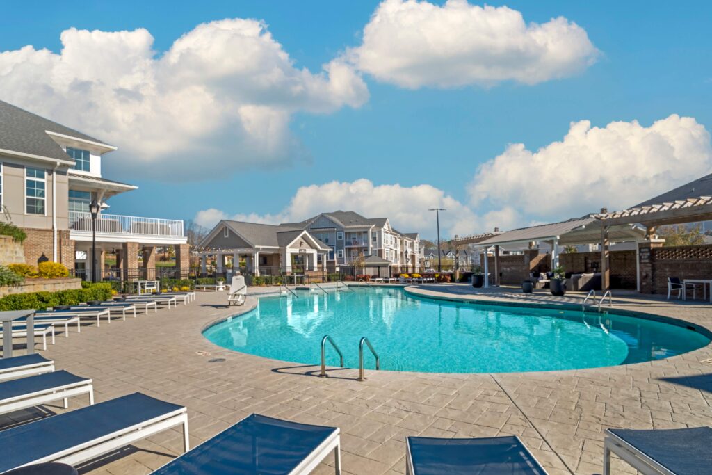 Pool with deck seating and covered pavilion